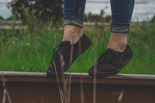 Woman Wearing Sneakers Outdoors